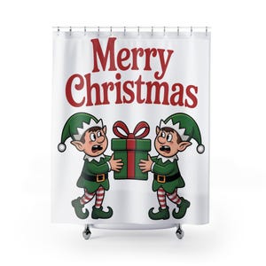 May include: White shower curtain with the words "Merry Christmas" in red. Two cartoon elves in green hats and outfits are holding a green gift box with a red bow. The elves have surprised expressions.