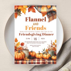 May include: A Friendsgiving dinner invitation with a watercolour design. The invitation features the text "Flannel and Friends" with autumn leaves, pumpkins, and a plaid pattern. The date and time are displayed, along with RSVP information.