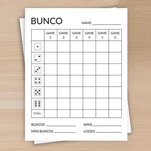 May include: A white Bunco score sheet with the word "BUNCO" at the top. The sheet has a grid for tracking game scores, with spaces for "GAME 1" through "GAME 6". There are also sections for "TOTAL", "BUNCOS", "MINI BUNCOS", "WINS", and "LOSSES".