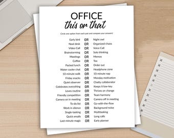 May include: A white paper titled "OFFICE this or that" with a list of work-related choices. The paper is on a wooden desk with a laptop and a notepad. The text includes options like "Early bird OR Night owl."