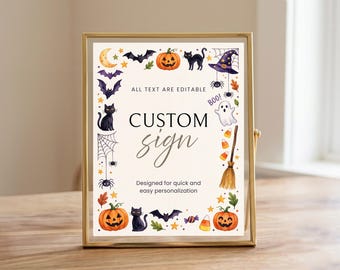 May include: A rectangular sign in a gold metal frame featuring a white background with a colorful Halloween-themed border of pumpkins, black cats, bats, a witch hat, a ghost, a broom, and candy. The text reads ALL TEXT ARE EDITABLE, CUSTOM sign, and Designed for quick and easy personalization.