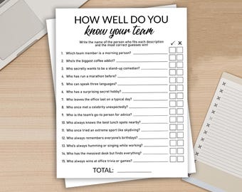 May include: A white paper game sheet titled "HOW WELL DO YOU know your team" with fill-in-the-blank questions. The game sheet includes a checklist and a space for the total score. A laptop and notepad are in the background.