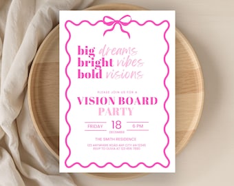 May include: A white invitation with a pink wavy border and bow design. The text reads "big dreams, bright vibes, bold visions" and invites guests to a Vision Board Party on December 18th at 6 PM. The invitation is on a wooden tray.