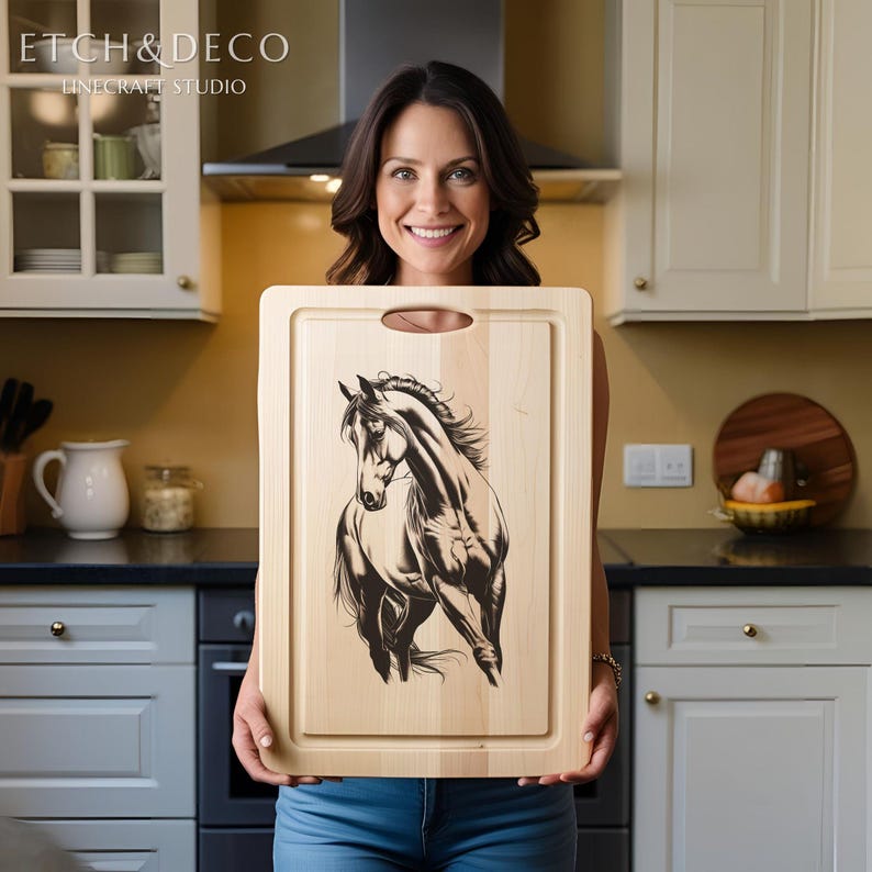 May include: A rectangular wooden cutting board with a carved horse design. The horse is depicted in black and white, with a detailed mane and muscular build. The board has a handle and a juice groove. The text "ETCH & DECO" and "LINECRAFT STUDIO" is visible.