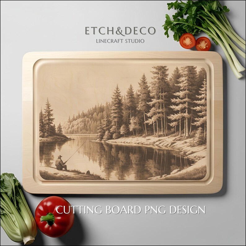 May include: A rectangular wooden cutting board with a sepia-toned engraved landscape of a lake and forest, featuring a person fishing. The text "ETCH&DECO LINE CRAFT STUDIO" is at the top, and "CUTTING BOARD PNG DESIGN" at the bottom.
