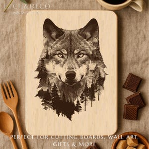 May include: Wooden cutting board with a detailed wolf portrait design. The wolf's face is intricately etched, with a forest scene incorporated into the design. The board has rounded corners and is made of light-colored wood.