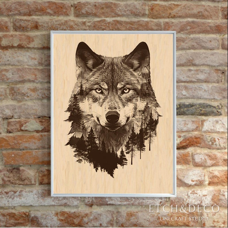 May include: Framed art print featuring a detailed illustration of a wolf's head, with a forest scene integrated into the fur. The artwork is in shades of brown and gray, set against a light wood grain background. The frame is silver, and the print is displayed on a brick wall.