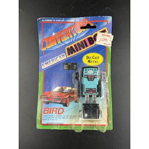 American Mini Bot Bird Die-Cast Metal Vintage Convert Robot To Car Toy In Original Packaging