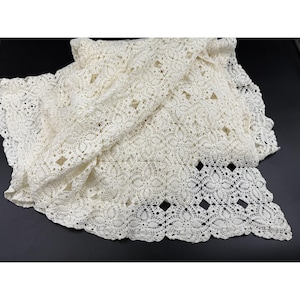 May include: A set of three ceramic mugs with a speckled, matte finish. The mugs are in shades of cream, light gray, and dark gray. Each mug has a simple, minimalist design and a rounded handle. The mugs are stacked on top of each other.