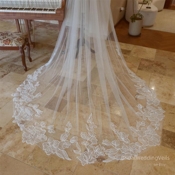 Elegant Light Ivory White Tulle Wedding Veil for Bride Amazon.com: YMGSCC 2M Length Pearls Wedding Veil Tulle 1T  main image 4