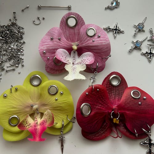 Pierced orchid keychain - gold and silver hardware