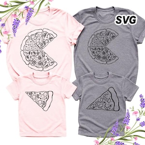 May include: Four t-shirts, two pink and two gray, each with a black pizza slice design. The pink shirts have a large pizza slice design, while the gray shirts have a smaller slice design. The shirts are short-sleeved.