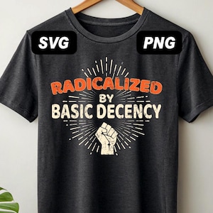 May include: A dark gray t-shirt with the text "Radicalized by Basic Decency" in orange and white. A stylized fist is in the center of the design.