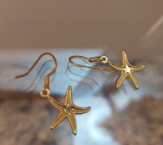 Starfish dangle earrings discount