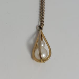 Vintage Caged Pearl Pendant Necklace on fine 12 K Gold chain.. Stamped