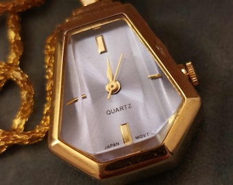 Japans blauw gefacetteerd vintage quartz-hanghorloge (in werking)