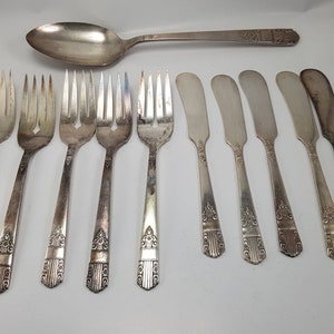 Sterling Plated Oneida Cutlery Set- England
