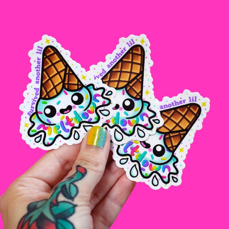 May include: Three die-cut stickers featuring a cartoon melting ice cream cone with a light blue scoop, brown waffle cone, and colorful sprinkles. The text "survived another lil meltdown" is printed in purple around the ice cream illustration.