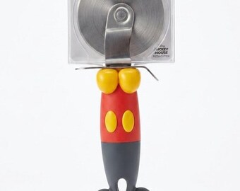 Cortador de pizza vintage nuevo en su empaque original de Disney Eats con forma de Mickey Mouse.