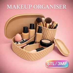 May include: A beige makeup organiser with a waffle-like texture, filled with makeup brushes, bottles, and a sponge. The open lid rests behind the organiser. The text "MAKEUP ORGANISER" is at the top, and "STL/3MF" is at the bottom.