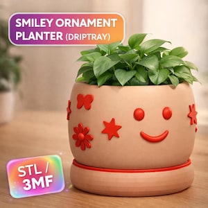 May include: A beige smiley face planter with a red drip tray, decorated with red stars, flowers, and a butterfly. The planter holds green leafy plants. Text on the image reads "SMILEY ORNAMENT PLANTER (DRIPTRAY)" and "STL / 3MF".