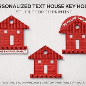 May include: Red house-shaped key holders with personalized text. One holder has keys attached. The text on the holders reads "THE SHARMA FAMILY" and "THE WILLIAM HOUSE 1992". The key holders are designed for 3D printing.