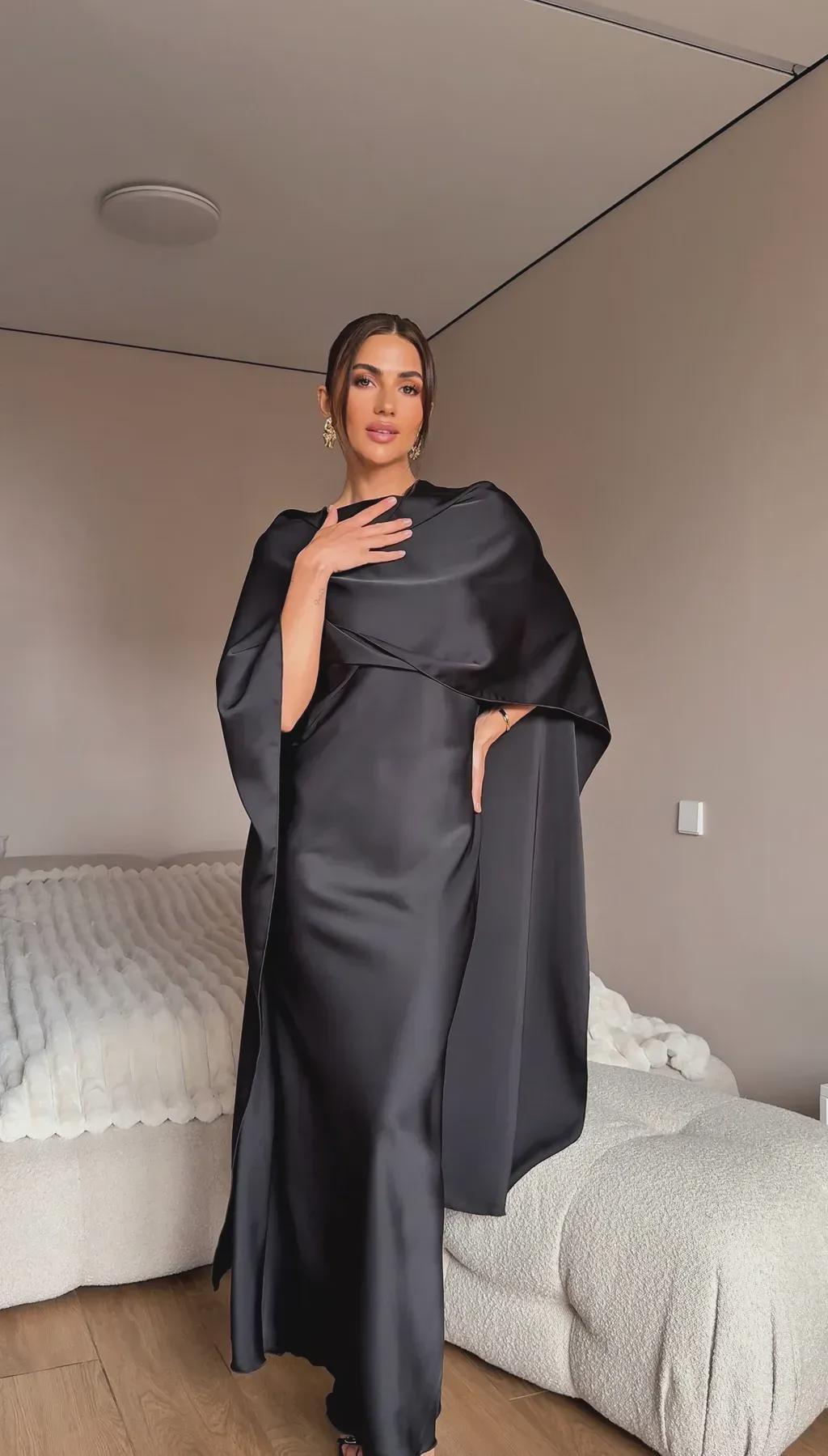 formal dress with shawl Graceful black evening dress with a gold satin shawl and floral detail,  perfect for a glamorous night.. #EveningDress #ElegantStyle  #GlamorousLook #ChicAndElegant #BlackAndGold #LuxuryFashion
