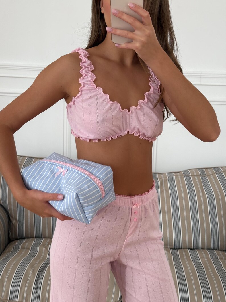 May include: A rustic wooden sign with the text "Welcome to our home" in white lettering. The sign features a distressed finish and a simple, inviting design, perfect for entryway decor.