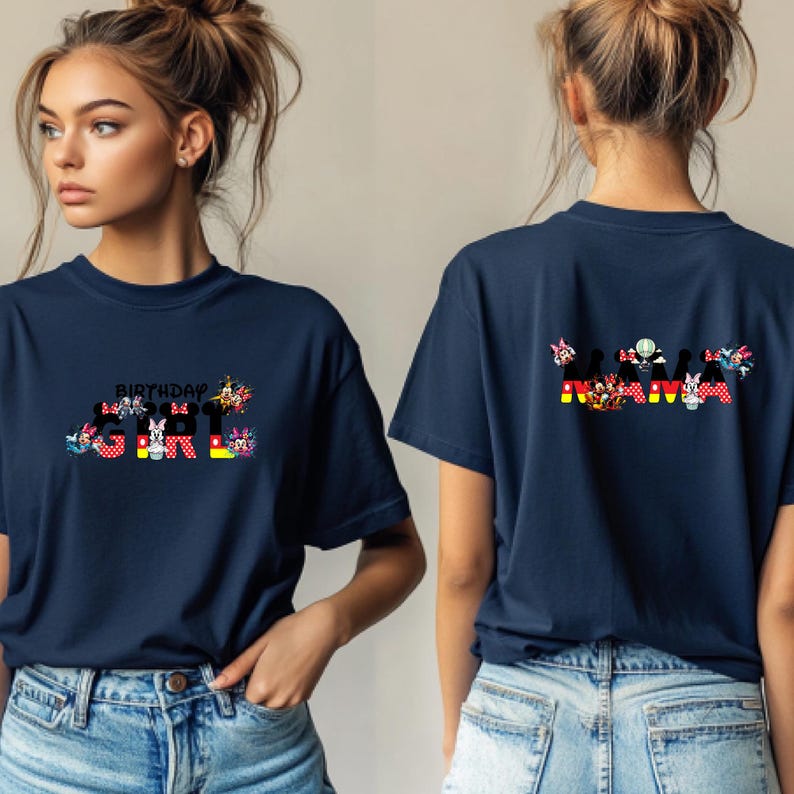 May include: Two navy blue t-shirts with a Mickey Mouse themed design. The front shirt says "Birthday Girl" with Mickey Mouse characters. The back shirt says "Mama" with Mickey Mouse characters.