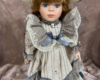 Multi Racial Porcelain Doll 16