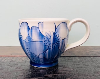 Ceramic coffee mug with cobalt blue flowers
