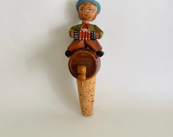 Carved Wooden Cork Bottle Stopper with Boy Playing Accordion by ANRI from Italy