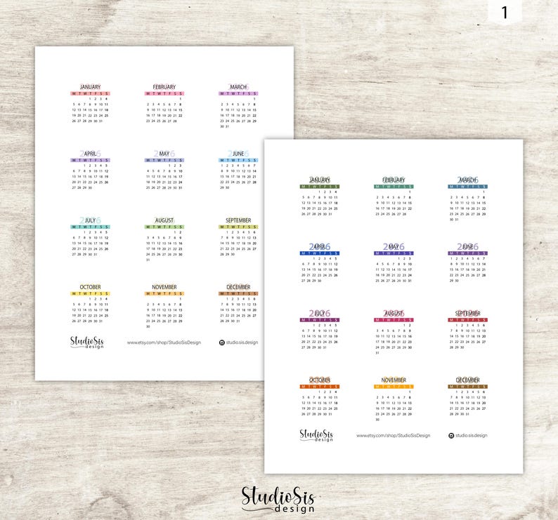 May include: Two white sheets of paper with colorful monthly calendars for the year 2006. Each month is labeled with a different color. The Studio Sis design logo is at the bottom.