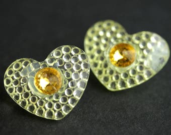 Two (2) Light Yellow Heart Buttons. Yellow Buttons. Clear Acrylic Buttons. Plastic Buttons with Rhinestone Centers. 20mm x 26mm