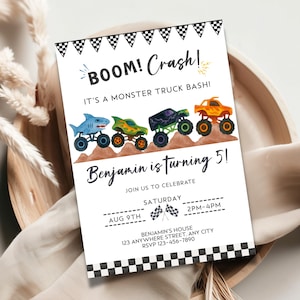 May include: A white invitation card with the text "BOOM! Crash! It's a Monster Truck Bash!" and "Benjamin is turning 5!" features illustrations of monster trucks. The card includes event details: August 9th, 2 PM-4 PM.