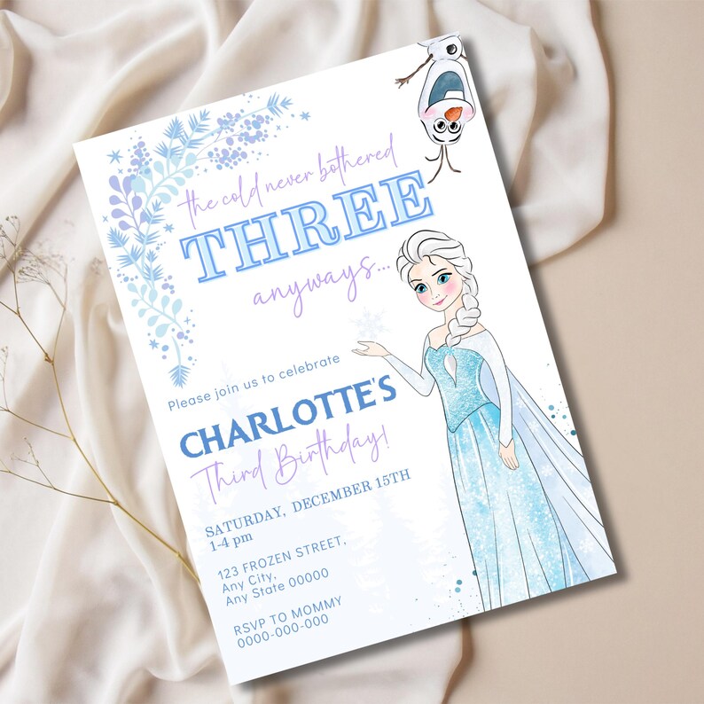 May include: A light blue and white birthday invitation featuring Elsa from Frozen. The invitation reads "the cold never bothered THREE anyways..." and includes details for Charlotte's third birthday, including the date, time, and location.