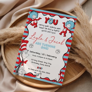 May include: A colorful invitation with a red and blue striped border, featuring illustrations of characters and text. The invitation reads "Layla & Jacob are turning one!" and includes event details.