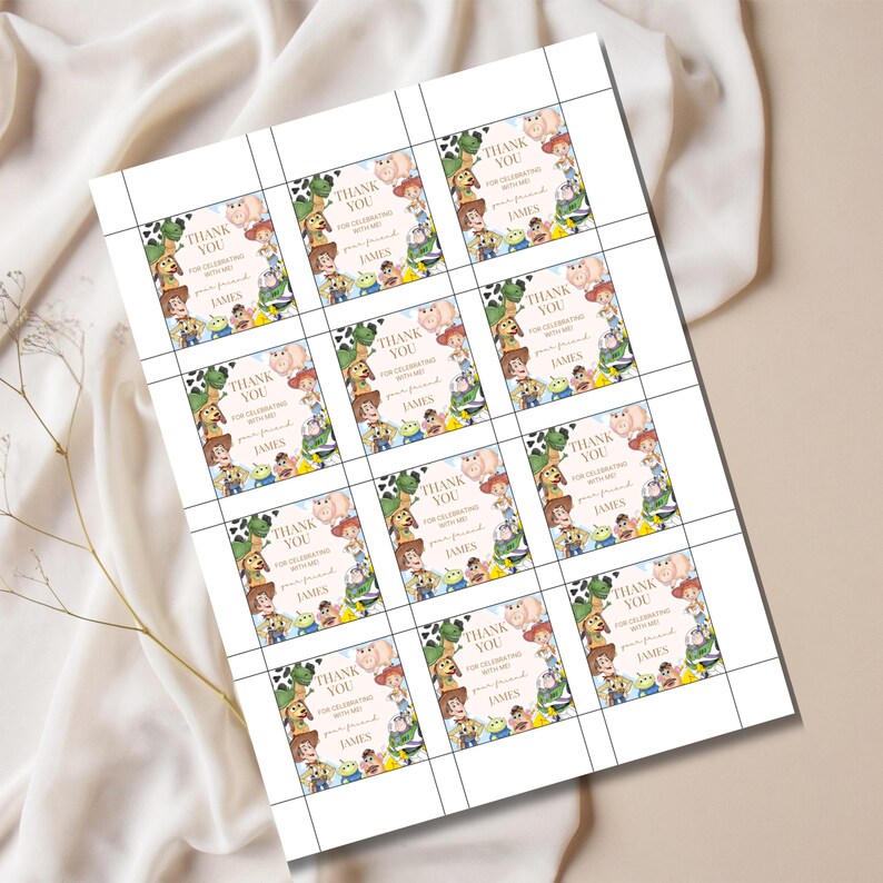 May include: A sheet of printed cards featuring characters from a popular animated film. Each card has a border of characters and the text "THANK YOU FOR CELEBRATING WITH ME" and the name "JAMES".