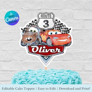 May include: A red and rusty car and a red race car with a Route 3 sign and the name Oliver on a red and silver cake topper.