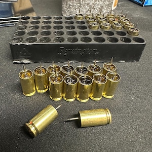 20 Once fired 9mm brass push pins