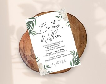 May include: A wedding invitation featuring the names "Brittny & William" in elegant script. The white card is adorned with floral and leaf accents in green and white. The invitation includes the date, time, and location of the wedding.