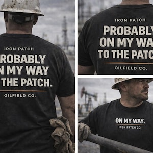 May include: Black t-shirt with the text "IRON PATCH PROBABLY ON MY WAY TO THE PATCH. OILFIELD CO." in white. The image shows a person wearing a hard hat and work gloves.