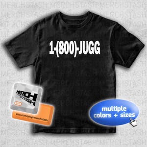 May include: Black t-shirt with the text "1-(800)-JUGG" in white. The shirt also features a shop logo and a button that says "multiple colors + sizes".