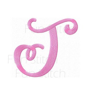 May include: Pink embroidered letter T with a cursive font style.