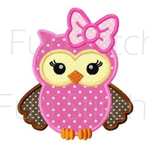 May include: A pink owl with brown wings and a pink bow on its head. The owl has yellow eyes and a yellow beak. The owl is covered in white polka dots.