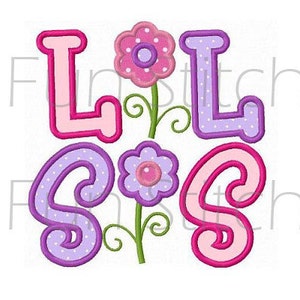 May include: Embroidered design featuring the words "Lil Sis" in pink and purple letters with white polka dots. The letters are surrounded by pink and purple flowers with green stems and leaves.