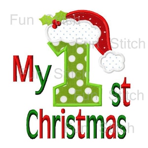 May include: Green and white polka dot number one with a red and white Santa hat. The text "My 1st Christmas" is in red and green.