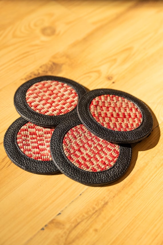 Authentic Peruvian Andean textile fabric paired with vegan leather — a genuinely artisan coaster with cultural story and material craft behind it.