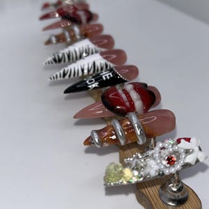 3d lip design nails, 3d design press on nails, zebra print nails, stiletto nails animal print nails junk nails French tip nails
