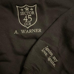 Shatter Me Embroidered Sweatshirt, Aaron Warner Shatter Me 45 Sector CCR Uniform Embroidered Sweatshirt, BookTok Merch, Bookish Merch